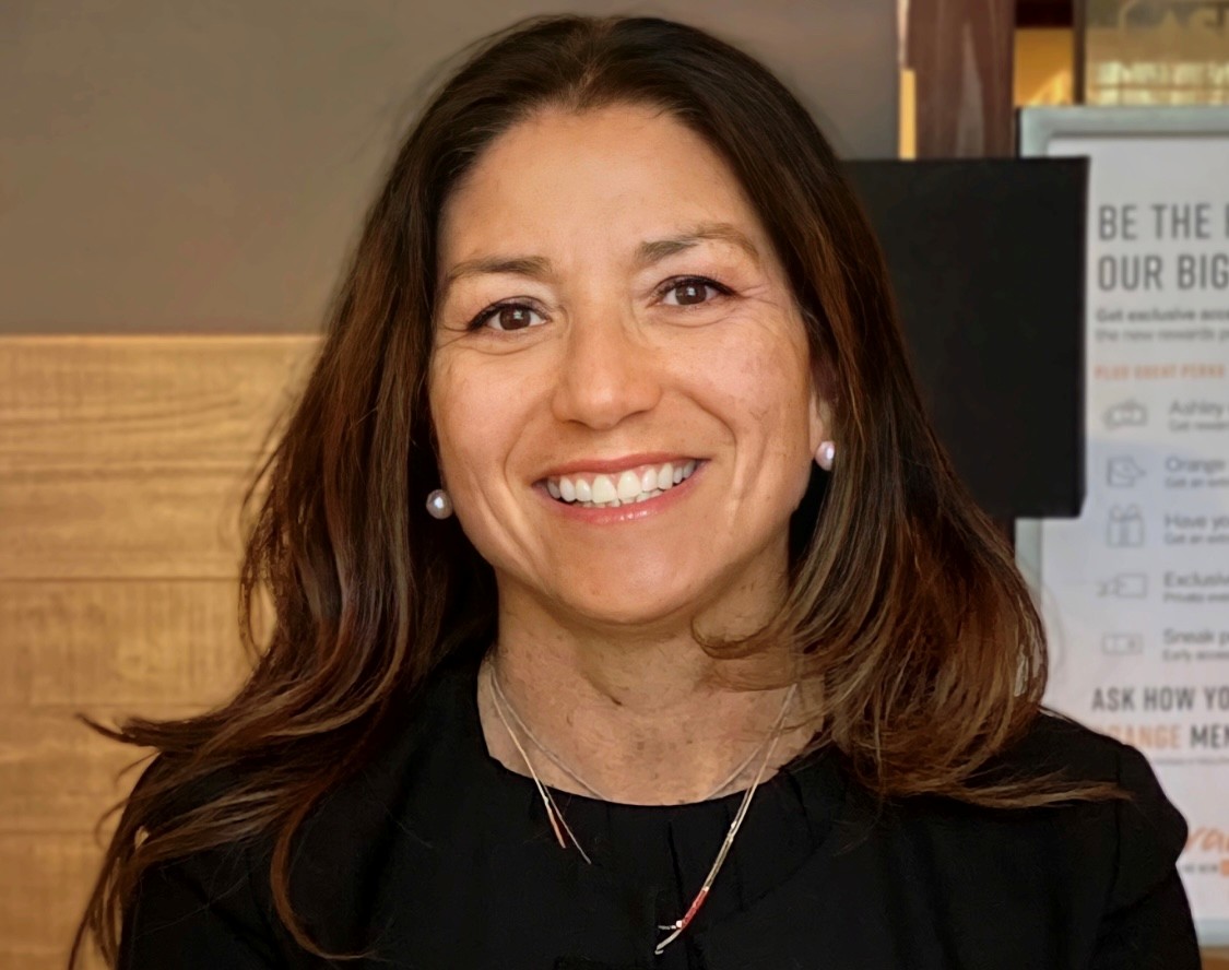Head shot of woman with long hair