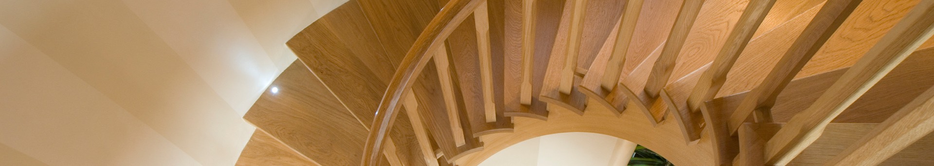 An image of a wooden spiral staircase
